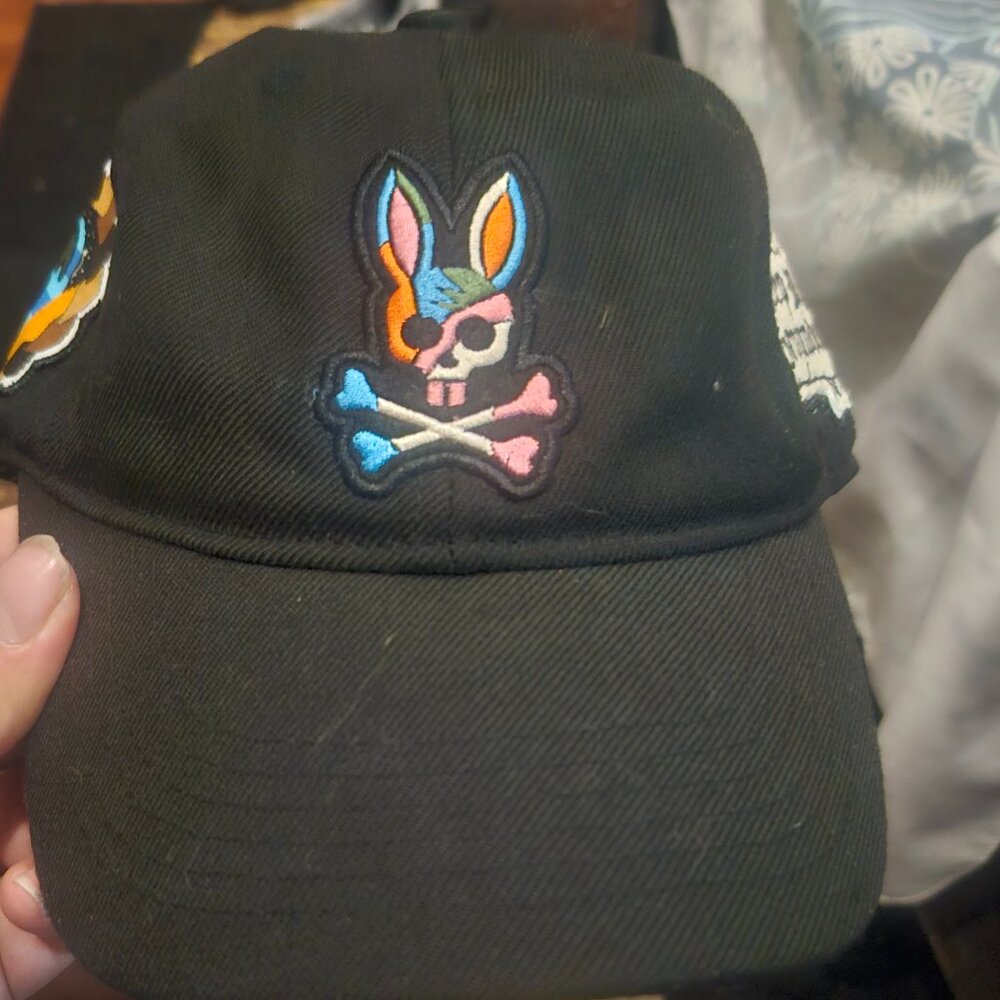 Mens Psycho Bunny trucker style hat. Runs small.